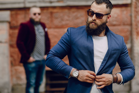 Two bearded men fashion outdoors summer weatherの写真素材