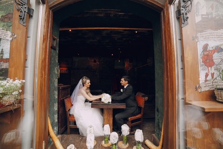 lovely wedding couple walking on their wedding dayの写真素材