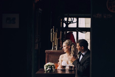 lovely wedding couple walking on their wedding dayの写真素材