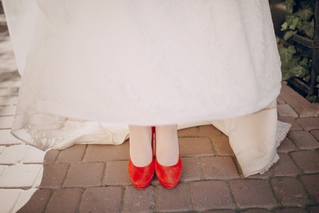 beautiful couple in wedding dress outdoors near the castleの写真素材