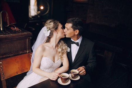 lovely wedding couple walking on their wedding dayの写真素材