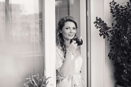 charming wedding couple celebrate their wedding day in Odessa winterの写真素材