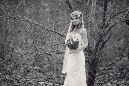 charming wedding couple celebrate their wedding day in Odessa winterの写真素材