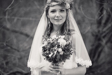 charming wedding couple celebrate their wedding day in Odessa winterの写真素材