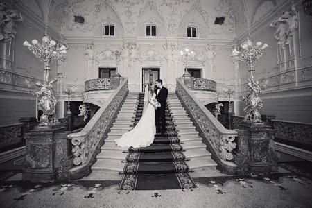 charming wedding couple celebrate their wedding day in Odessa winterの写真素材