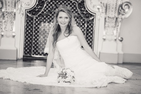 charming wedding couple celebrate their wedding day in Odessa winterの写真素材
