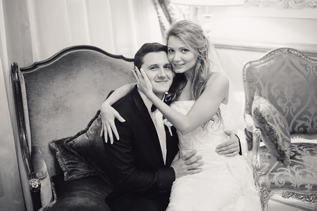 charming wedding couple celebrate their wedding day in Odessa winterの写真素材