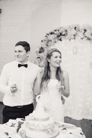 charming wedding couple celebrate their wedding day in Odessa winterの写真素材