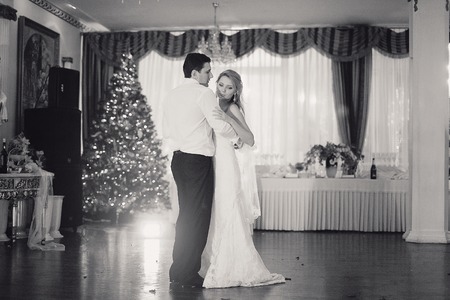 charming wedding couple celebrate their wedding day in Odessa winterの写真素材