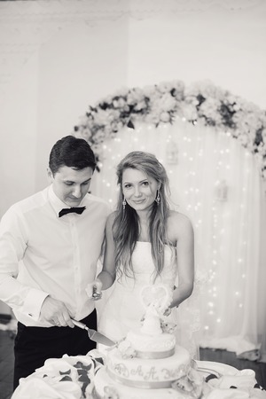 charming wedding couple celebrate their wedding day in Odessa winterの写真素材