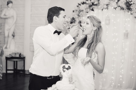charming wedding couple celebrate their wedding day in Odessa winterの写真素材