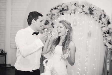 charming wedding couple celebrate their wedding day in Odessa winterの写真素材