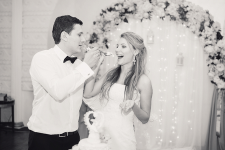 charming wedding couple celebrate their wedding day in Odessa winterの写真素材