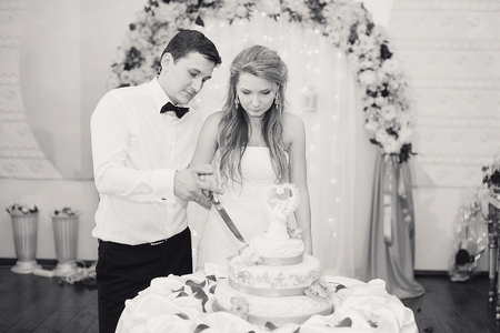 charming wedding couple celebrate their wedding day in Odessa winterの写真素材