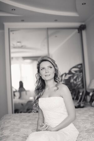 charming wedding couple celebrate their wedding day in Odessa winterの写真素材