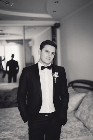 charming wedding couple celebrate their wedding day in Odessa winterの写真素材