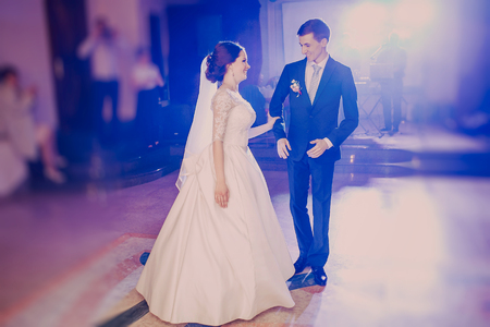 romantic couple dancing on their weddingの写真素材