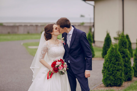 beautiful happy couple on their wedding enjoying this momentの写真素材