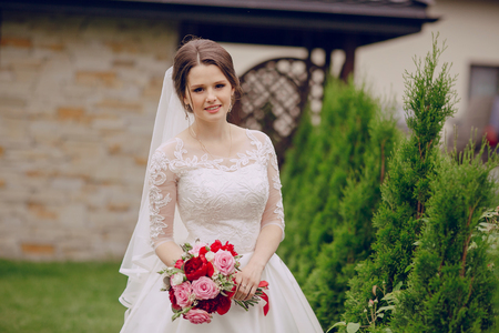 happy beautiful bride on her wedding enjoying this momentの写真素材