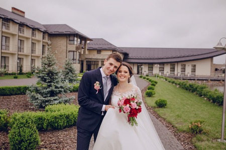 beautiful happy couple on their wedding enjoying this momentの写真素材