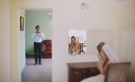 lovely wedding couple walking on their wedding dayの写真素材