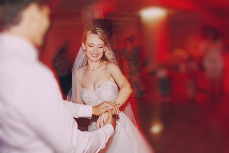 brides wedding party in the elegant restaurant with a wonderful light and atmosphereの写真素材