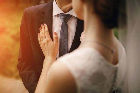 lovely blond summer wedding couple in sunny weatherの写真素材