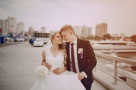 charming wedding elegant couples in elegant summer dress and wonderful weatherの写真素材