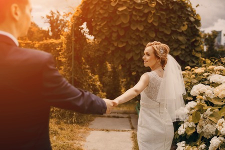 lovely blond summer wedding couple in sunny weatherの写真素材