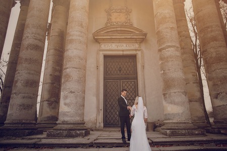 wedding day young couple with a brilliant golden autumnの写真素材