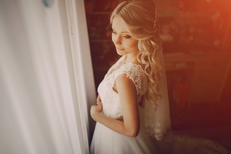 wedding day young couple with a brilliant golden autumnの写真素材