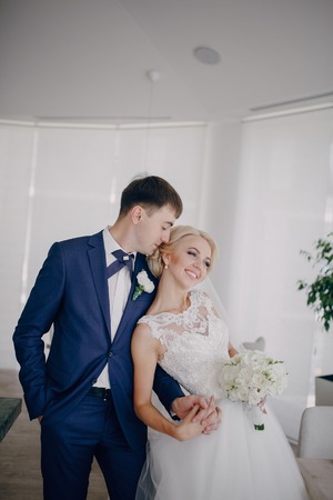 beautiful young wedding couple at restaurant HDの写真素材