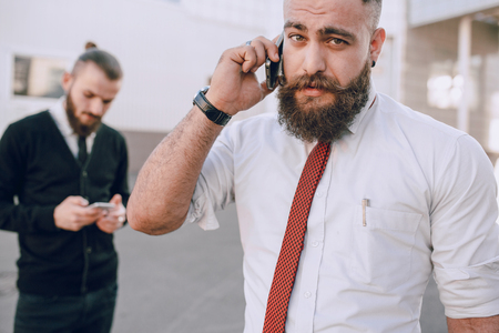 business man checking objects in glasses shirtの写真素材