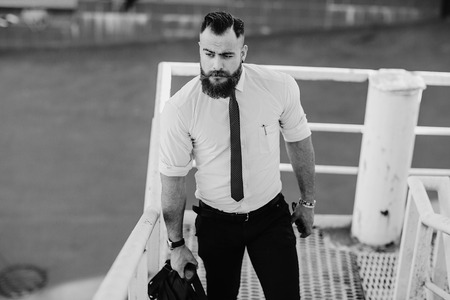 business man checking objects in glasses shirtの写真素材