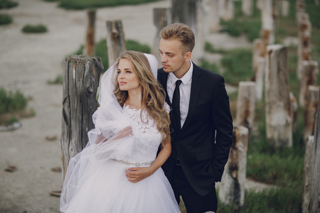 beautiful blonde couple celebrate their wedding dayの写真素材