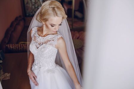 Morning brilliant blonde bride dress try on oreの写真素材