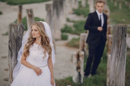 beautiful blonde couple celebrate their wedding dayの写真素材