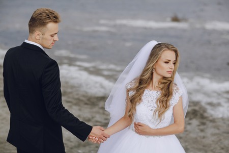 beautiful blonde couple celebrate their wedding dayの写真素材
