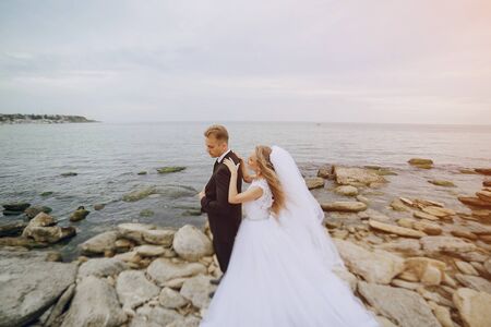 beautiful blonde couple celebrate their wedding dayの写真素材