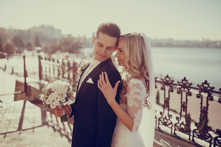 cervene wedding beautiful and fashionable young couple in autumnの写真素材