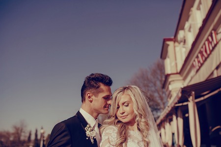 cervene wedding beautiful and fashionable young couple in autumnの写真素材