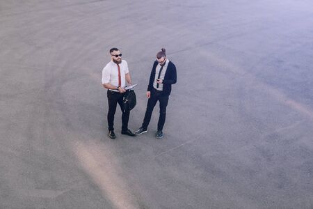 business man checking objects in glasses shirtの写真素材