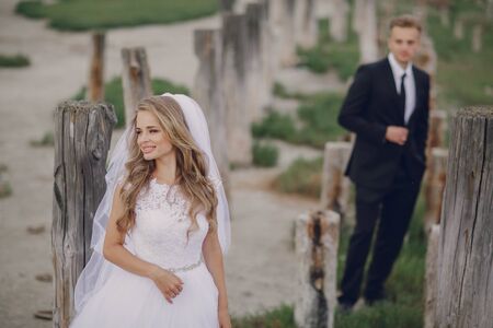beautiful blonde couple celebrate their wedding dayの写真素材
