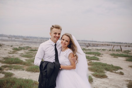 beautiful blonde couple celebrate their wedding dayの写真素材