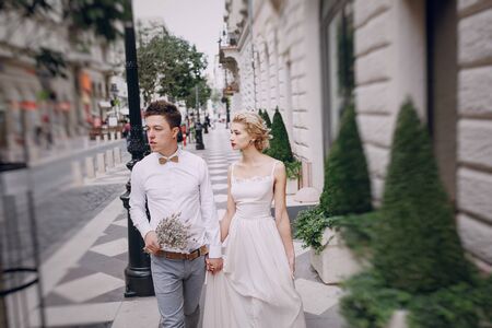 beautiful unique couple walks into your wedding day in Budapestの写真素材