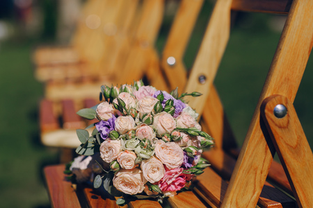 Beautiful wedding decorations for the ceremony outside in sunny weatherの写真素材
