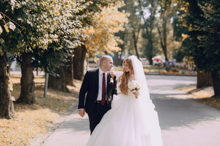 wonderful wedding curly bride and her handsome husbandの写真素材