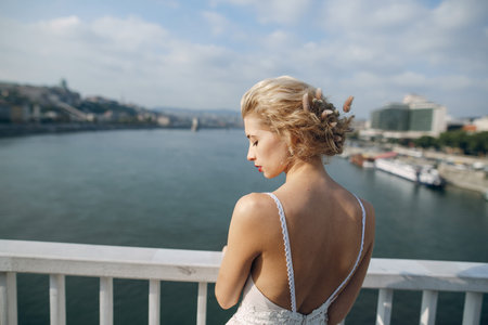gorgeous wedding couple walking in the old city of Budapest