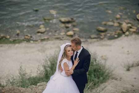 beautiful blonde couple celebrate their wedding day