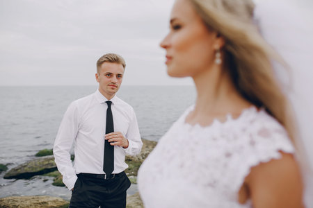 beautiful blonde couple celebrate their wedding dayの写真素材